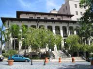This building likely was the former customs house as it is right near the port